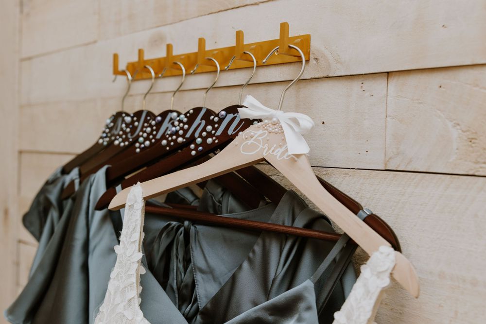 Wedding details at Ever After Farms Stockyard Barn captured by Lindsay McDow Photography. Top Knot Artistry, DJ Last Call