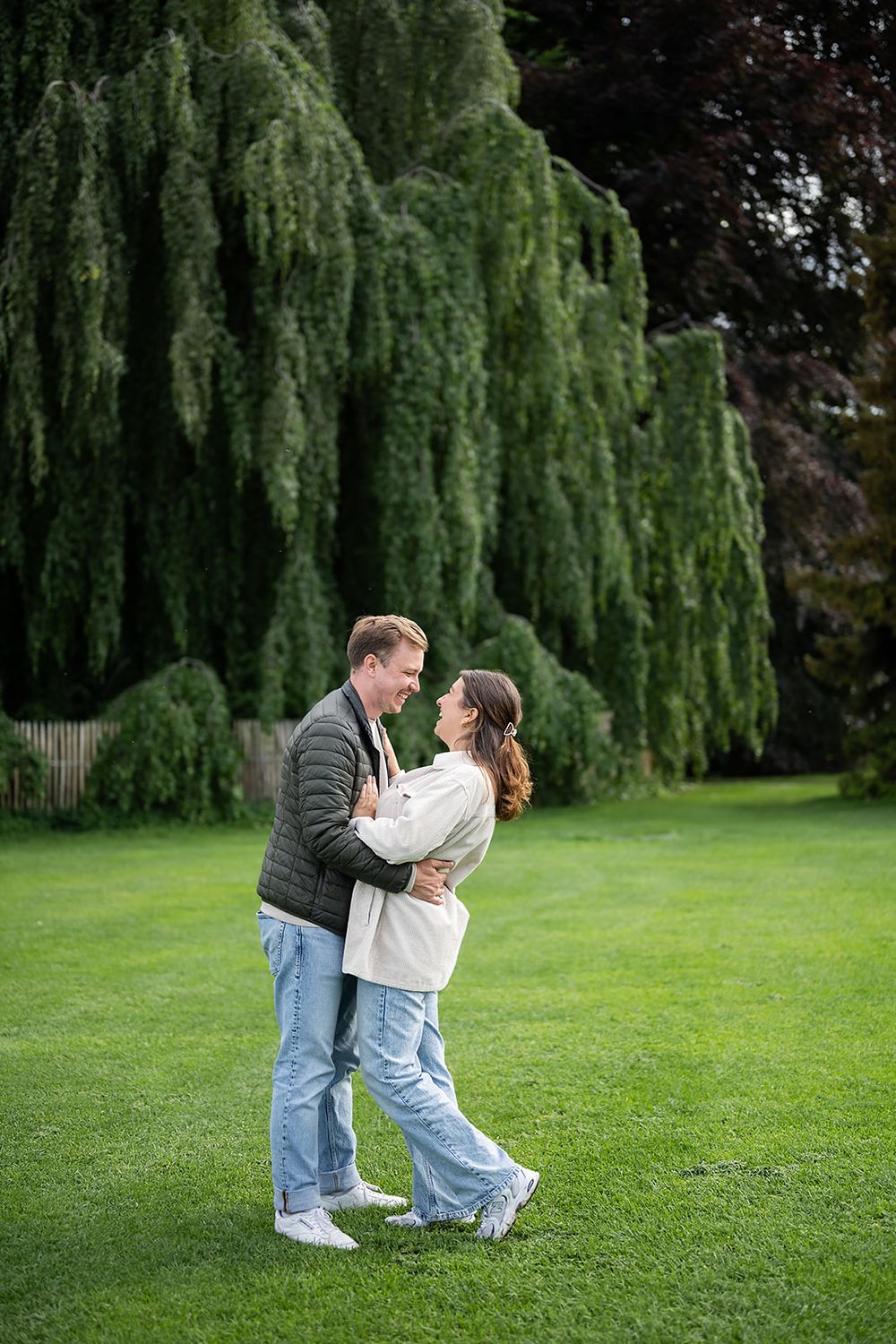 Modern young couple's simple engagement photo session in the city of Zurich, stylish and full of joy