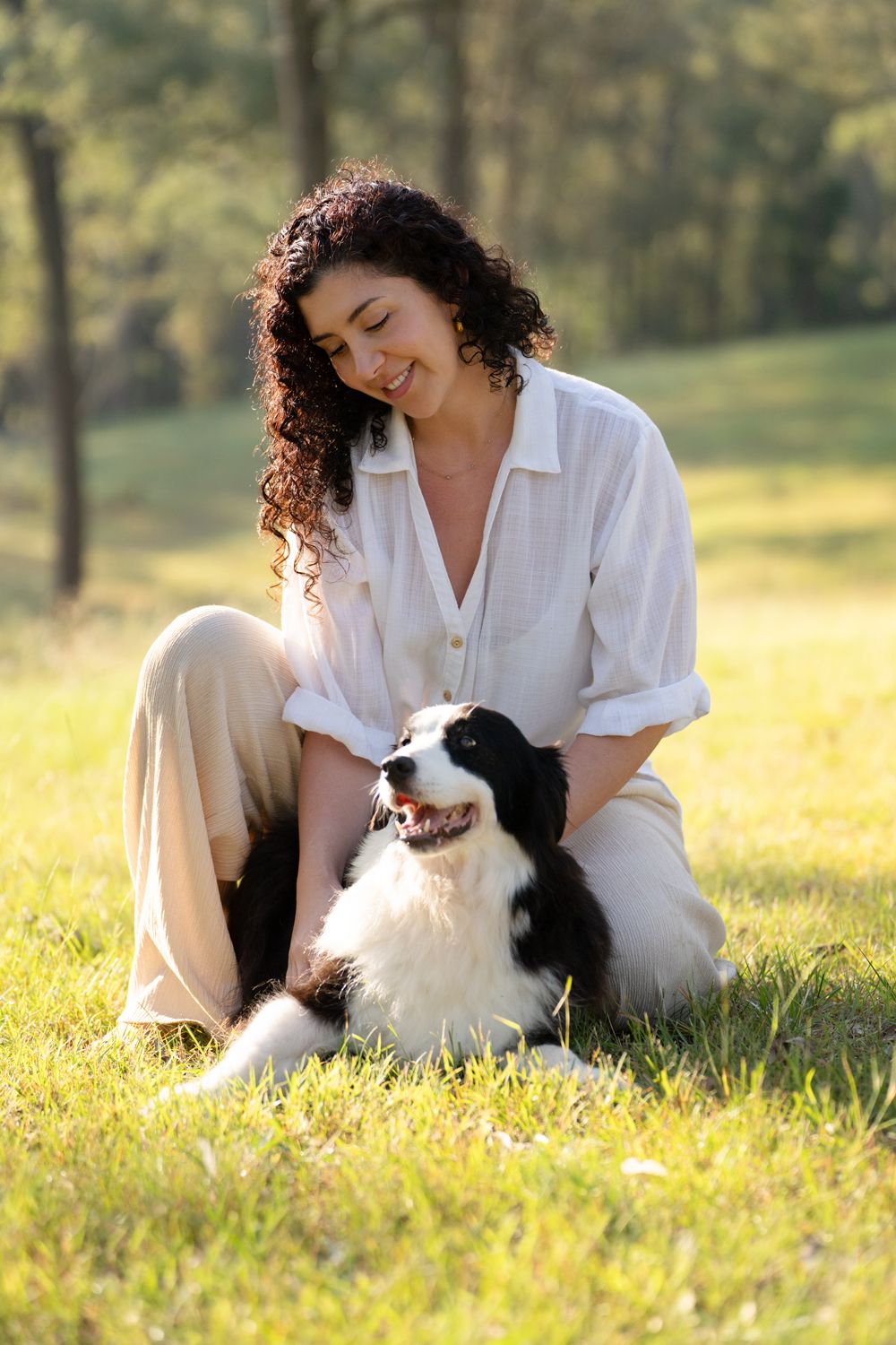 girl and her old border collie during an end of life canine photoshoot in Cattai