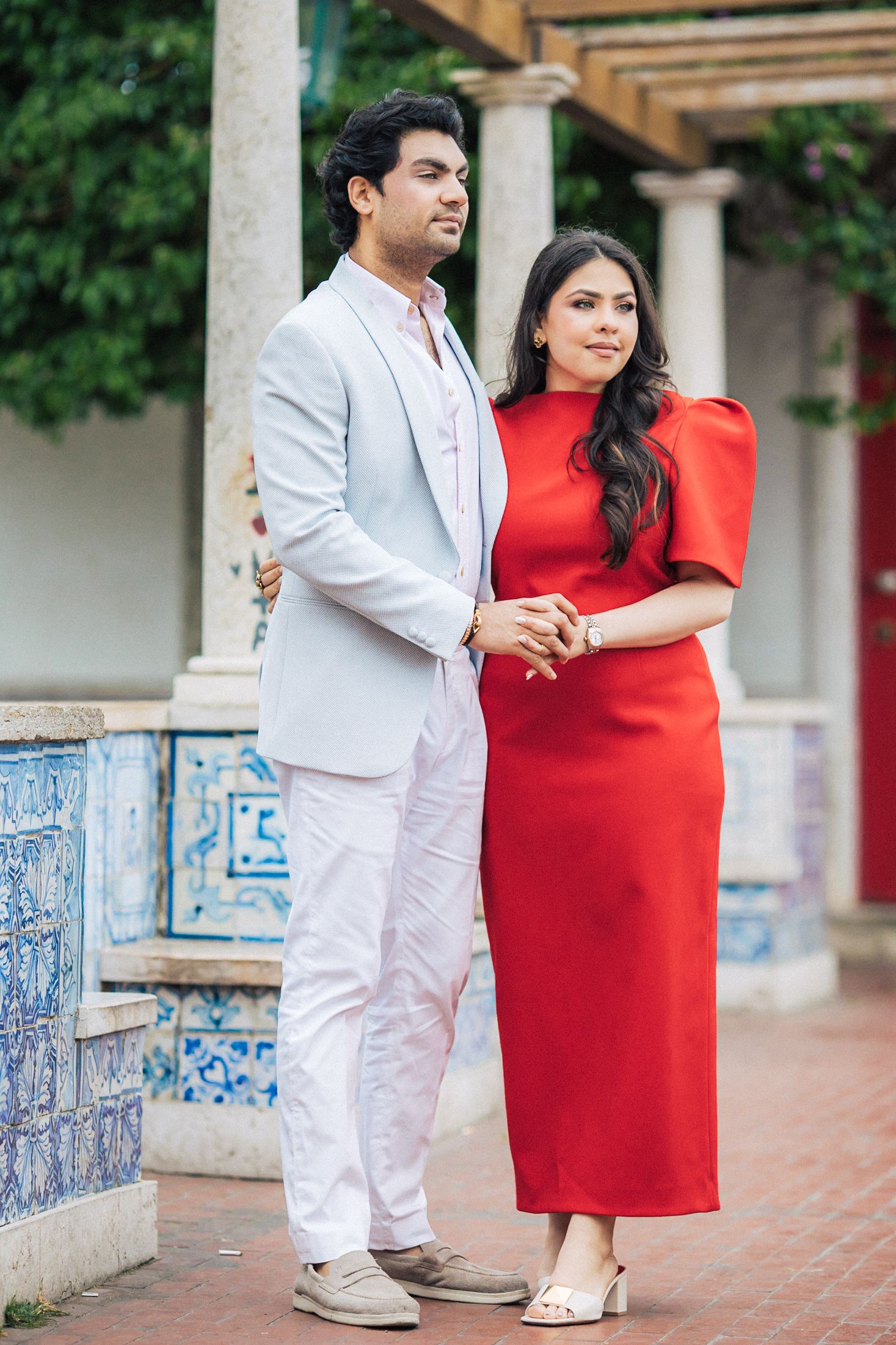 Romantic pre-wedding shoot in Lisbon with an Indian couple exploring historic city landmarks.