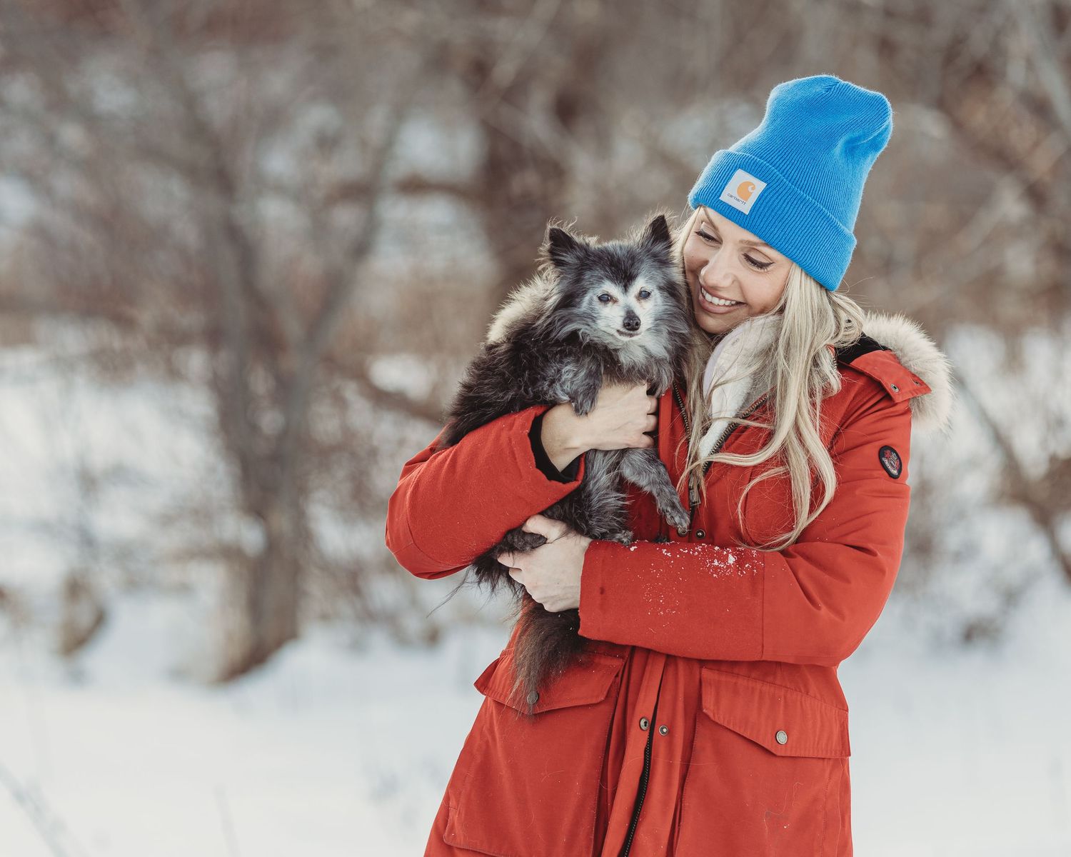 Professional photo of a woman with her dog