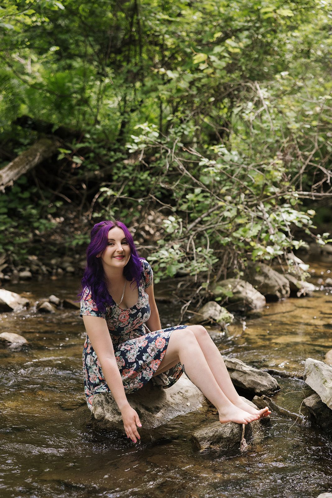 Wedding and family photographer with a love for nature. Photographing outdoor weddings. Walking bare foot in the river