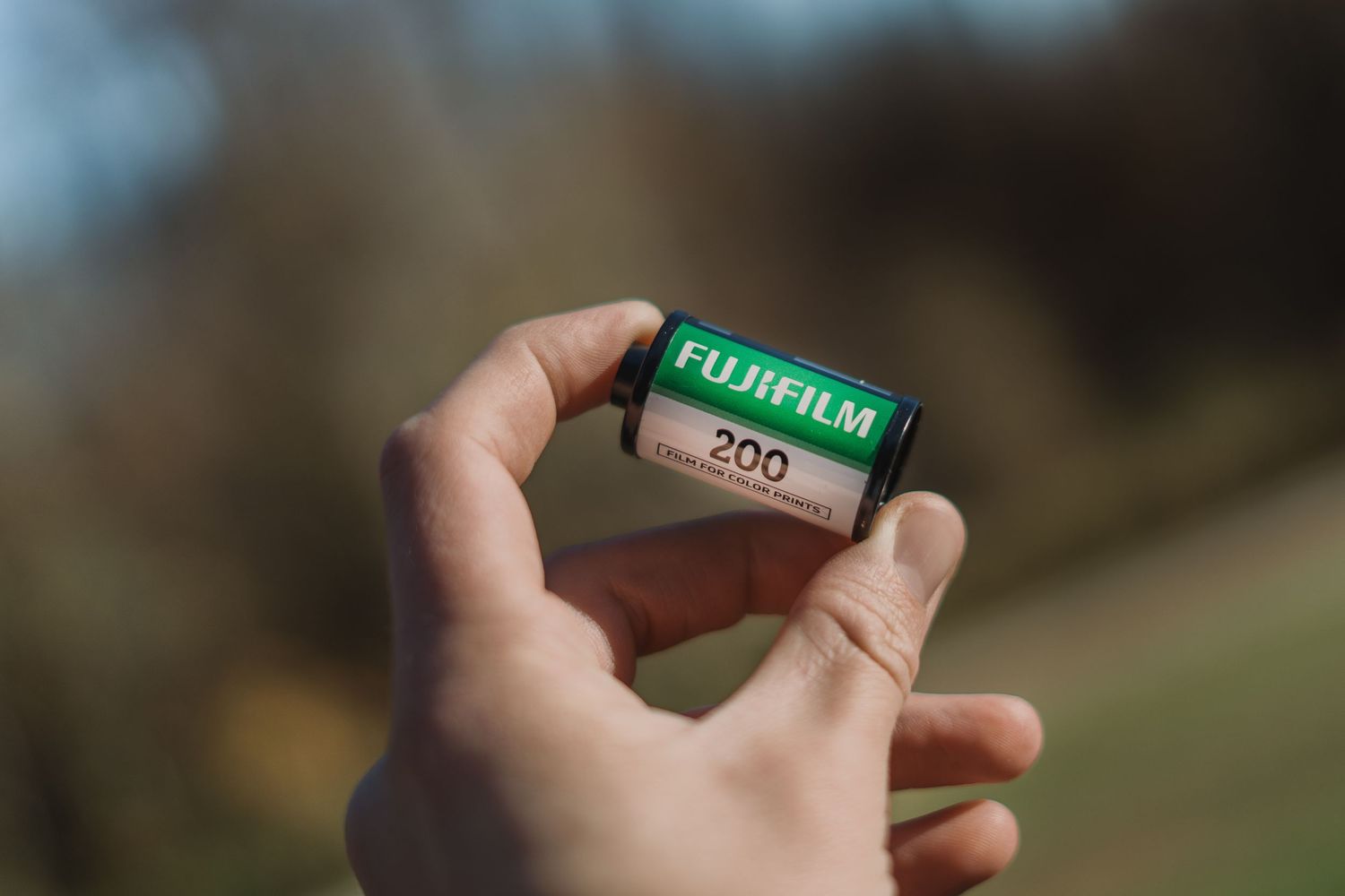 Person holding Fujifilm 200 ISO film roll