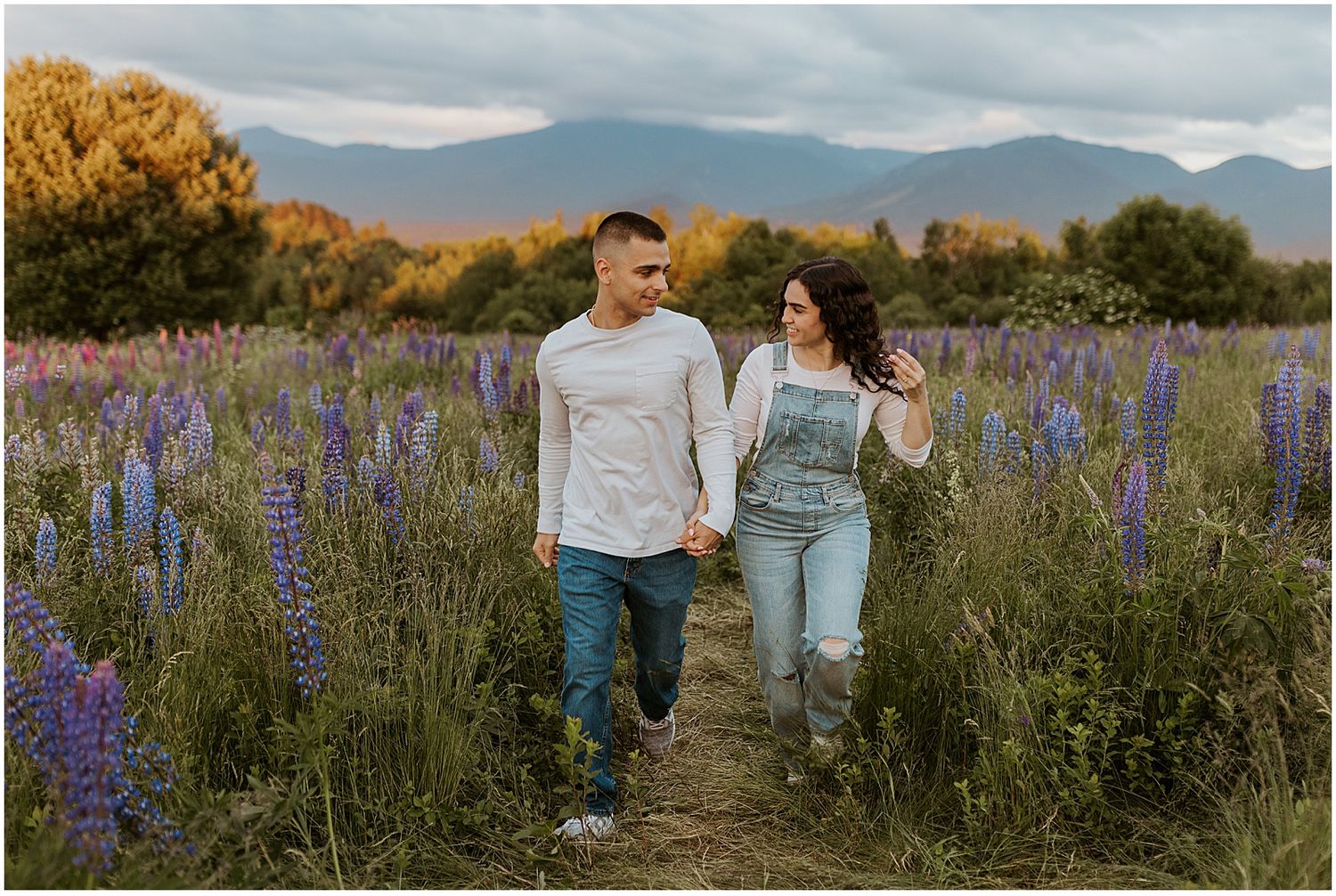 A NH couple during their lupine flower photo session