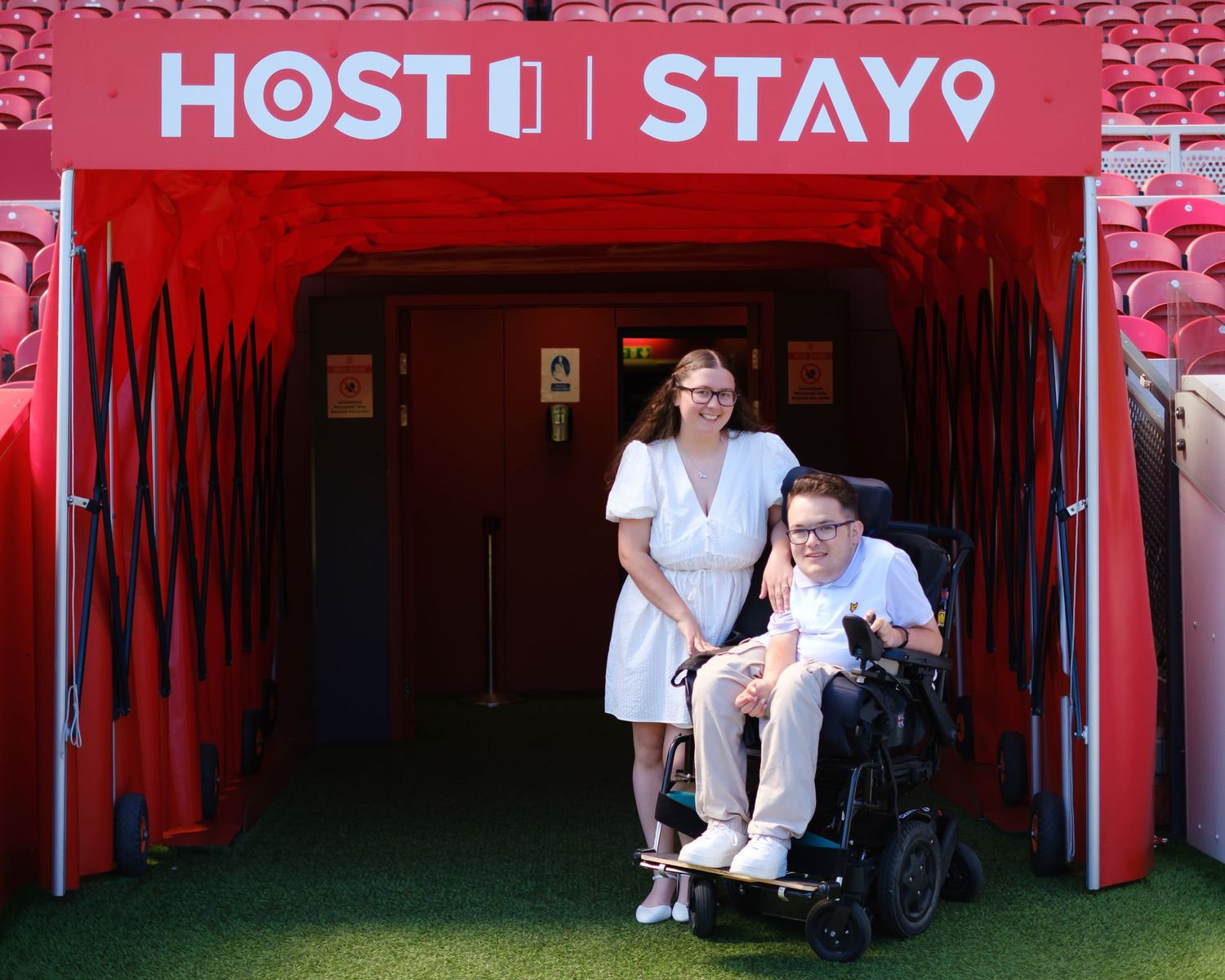 Lucy and Owen outside the tunnel at the football ground