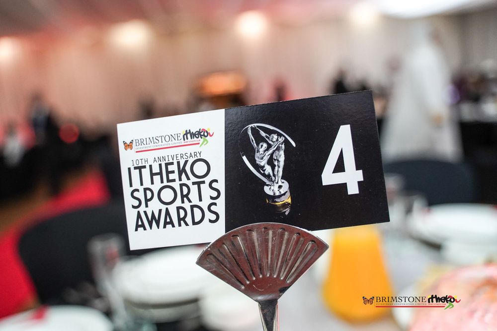 Close-up of Itheko Sports Awards table number 4 card with blurred background.
