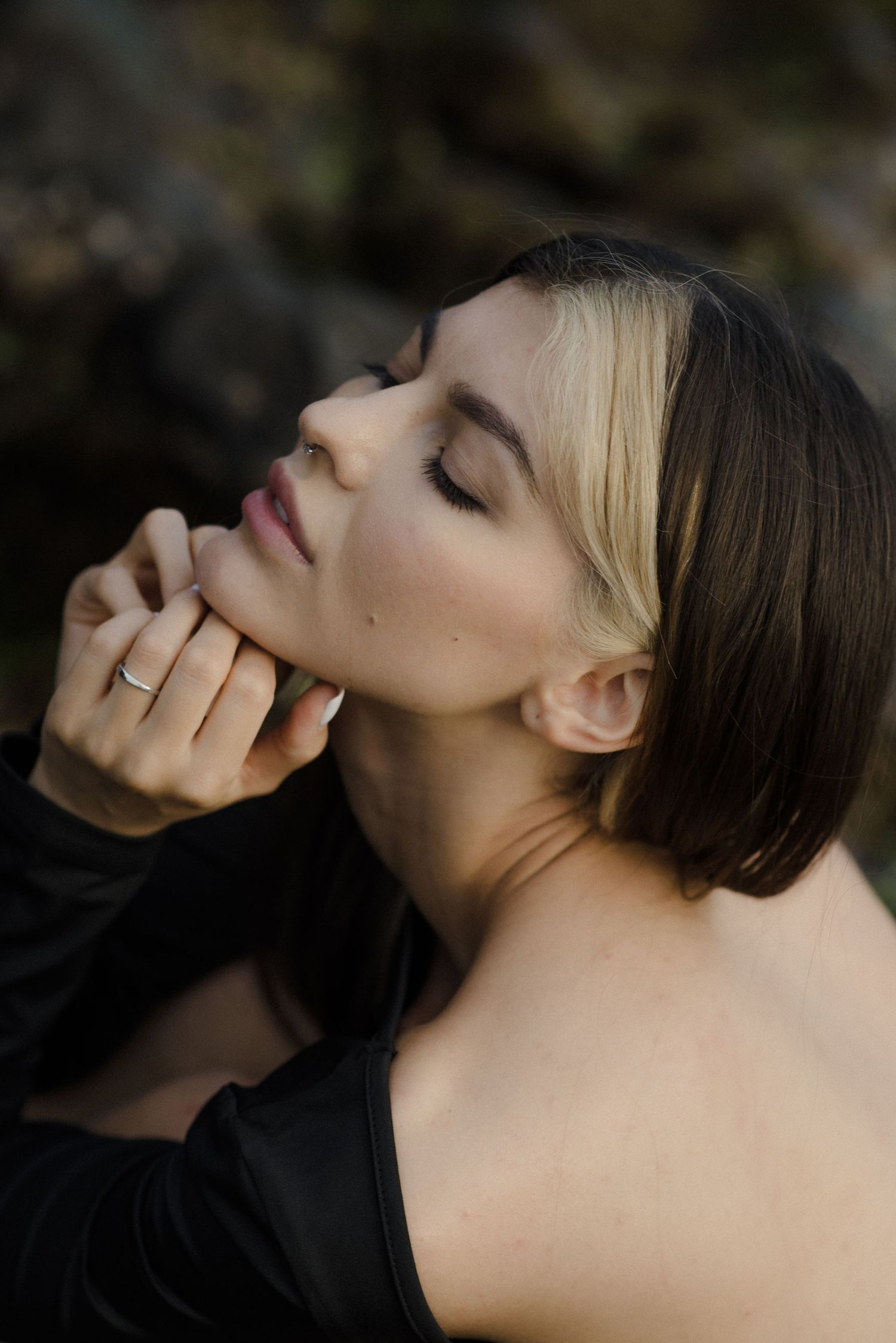 A series of portrait photos showing different emotional poses in side profile during a vacation photoshoot in Tenerife.