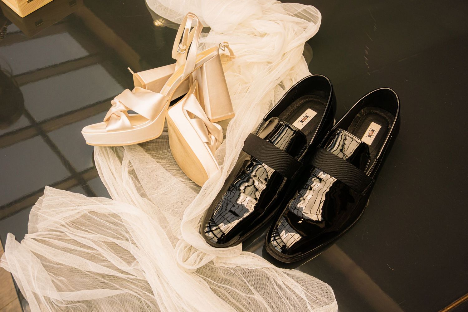 Colorado Springs Wedding Photographer. Photo of the bride and groom's shoes with the veil in a nice display.