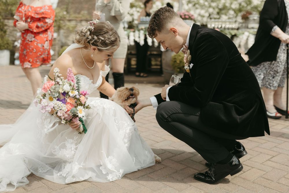 Wedding couple sharing a special moment during their outdoor celebration.