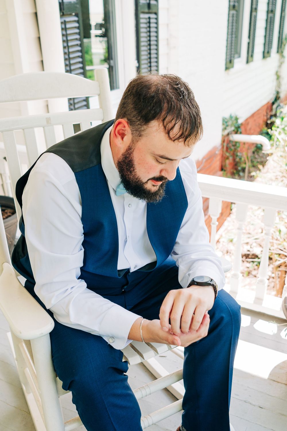 A collection of three photos showing a person in a navy vest and white shirt sitting thoughtfully on a porch swing.