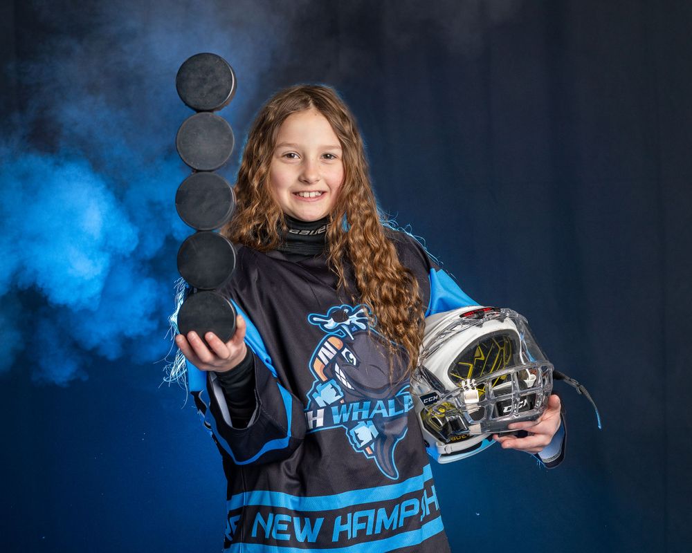 New Hampshire whalers youth hockey portraits with dramatic blue fog and lighting