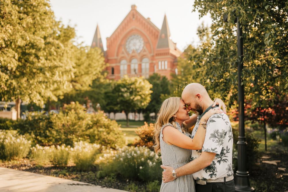 couple tenderly hugs hugs in front of music hall in over the rhine, Cincinnati