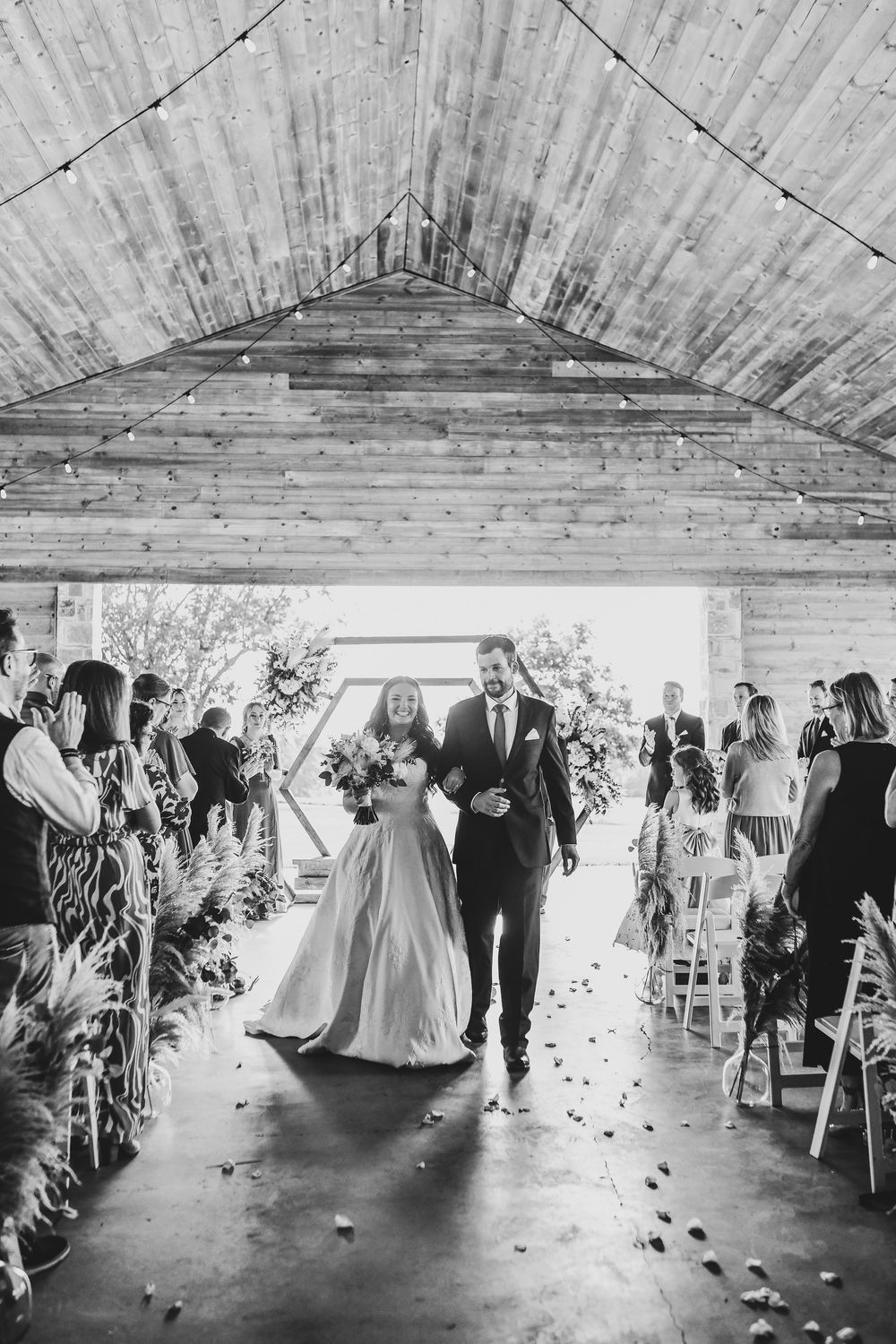 North Texas barn venue wedding ceremony with high-end rustic flair