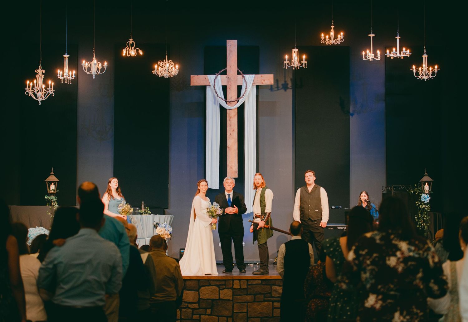 Bride and groom holding hands at ceremony