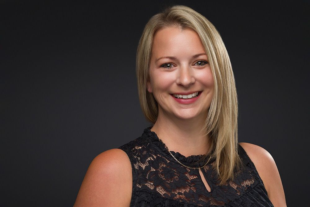 Professional headshots of a local real estate agent in Lehigh Valley shot on-location as part of a corporate headshot services in Easton