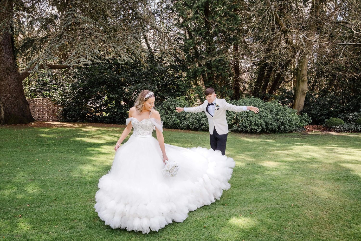 bride and groom laugh at The Orangery Maidstone Kent