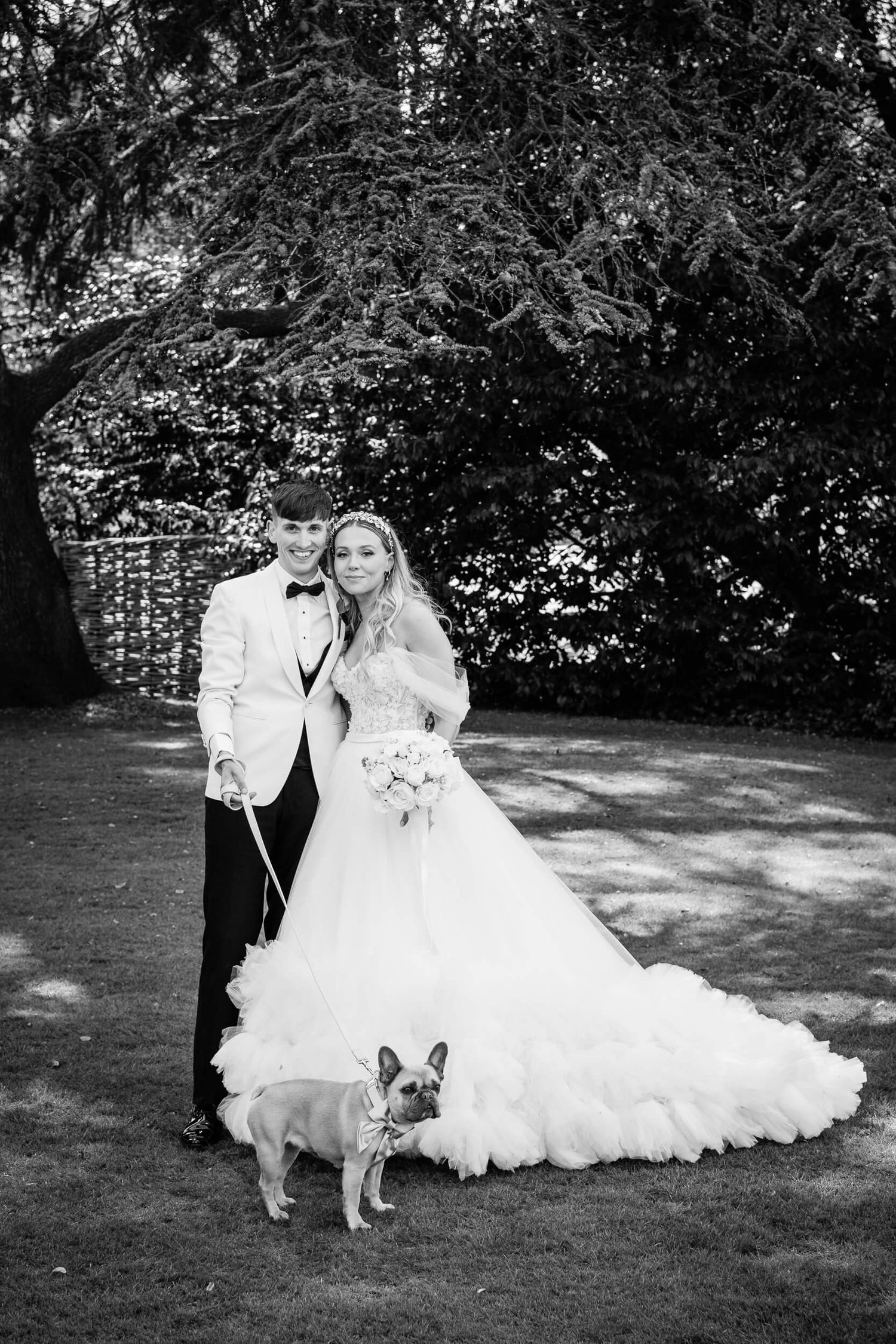 Bride and groom with do at wedding in kent