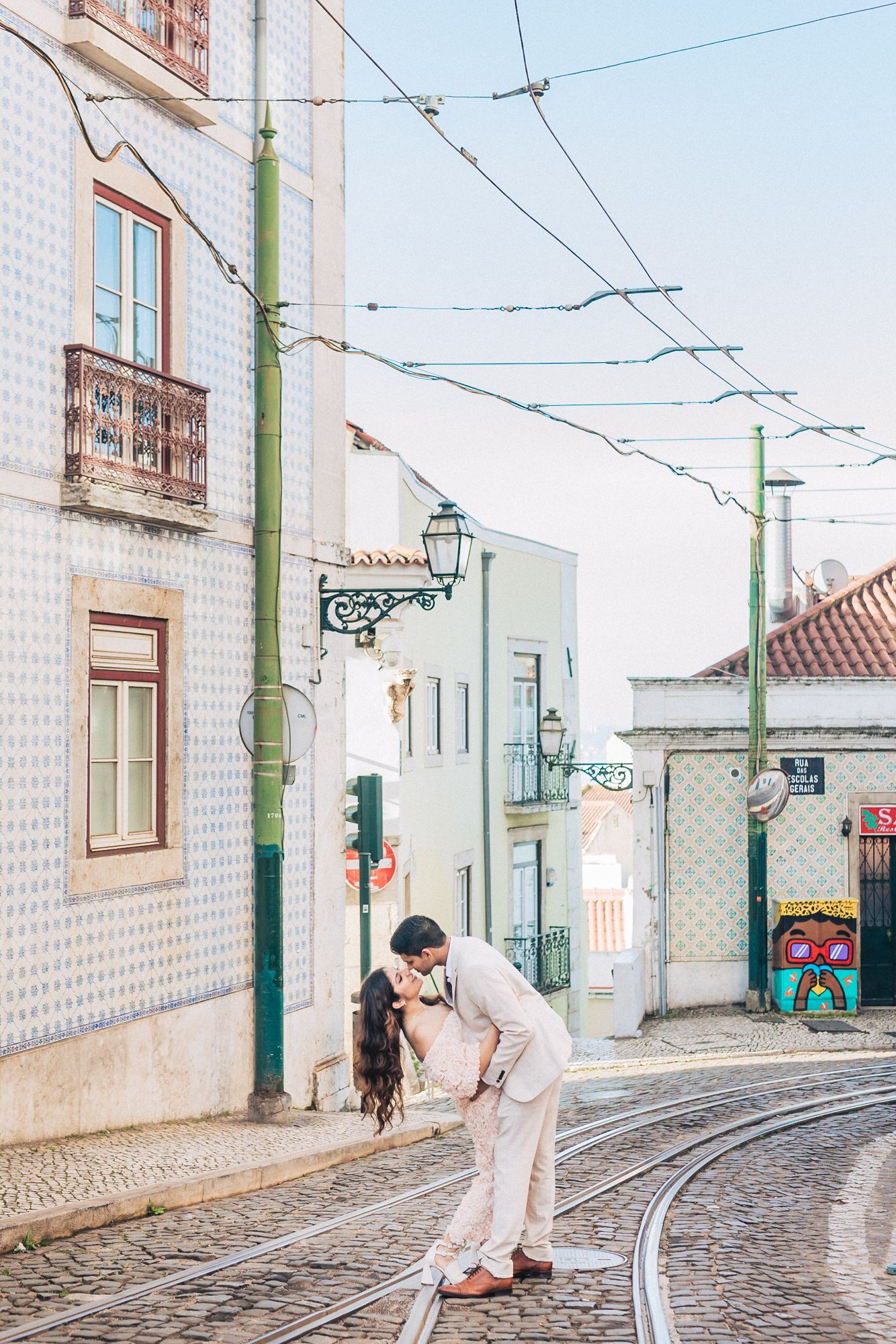 Romantic engagement photoshoot of an indian couple at the historical city of Lisbon during a Destination Wedding in Portugal
