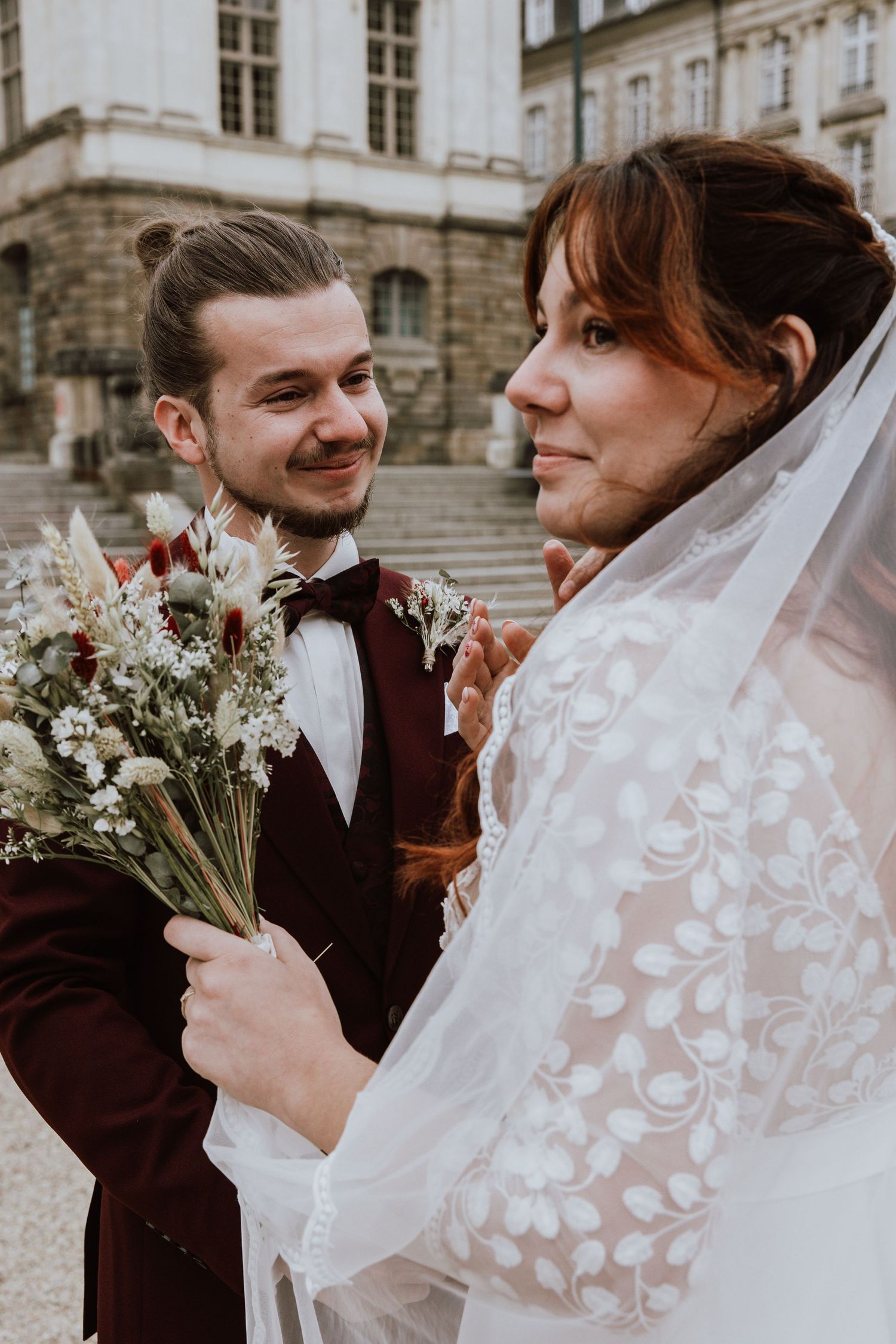 A romantic wedding photo sequence showing candid moments between newlyweds with delicate wildflower bouquet.