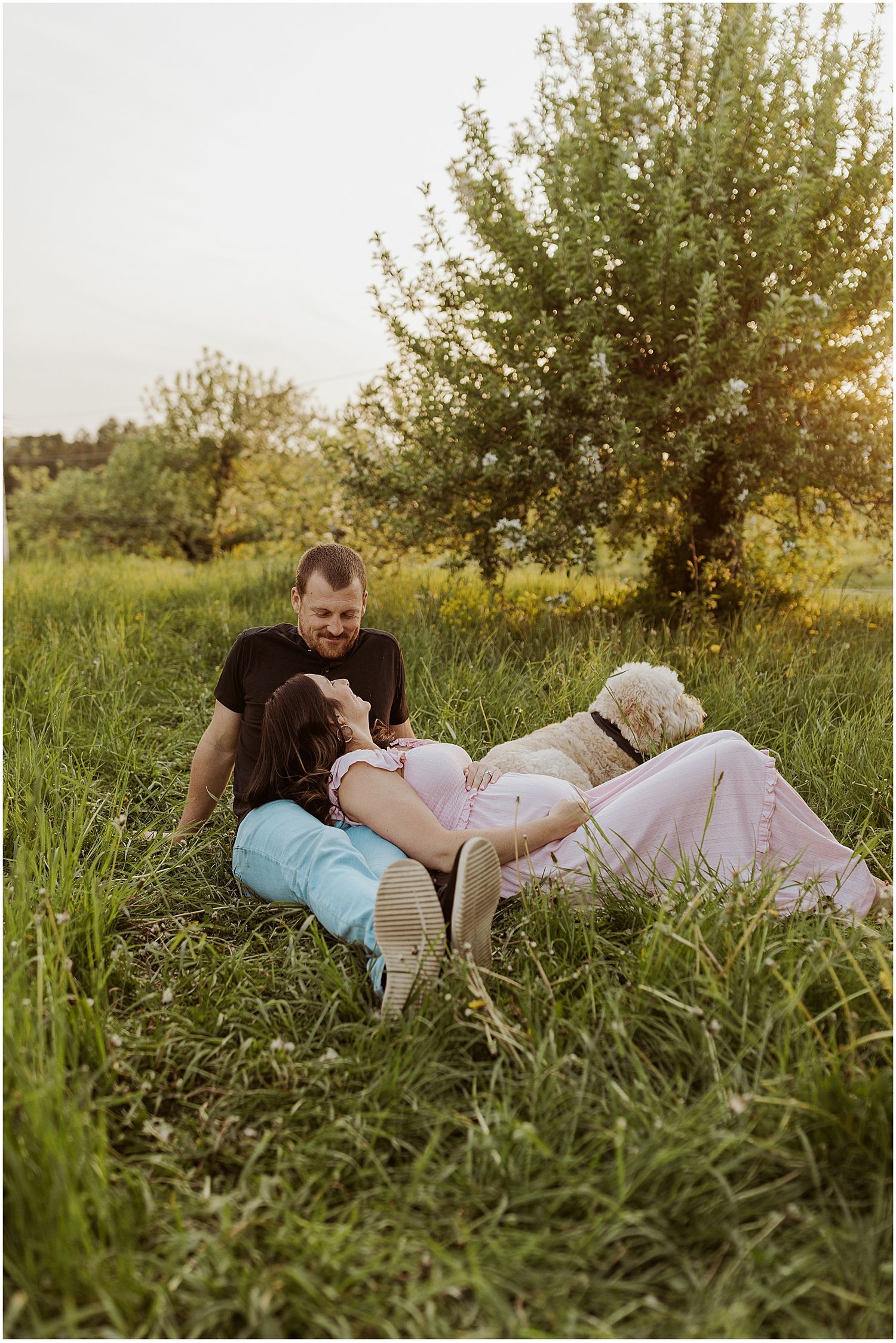 NH couple taking maternity photos with their dog