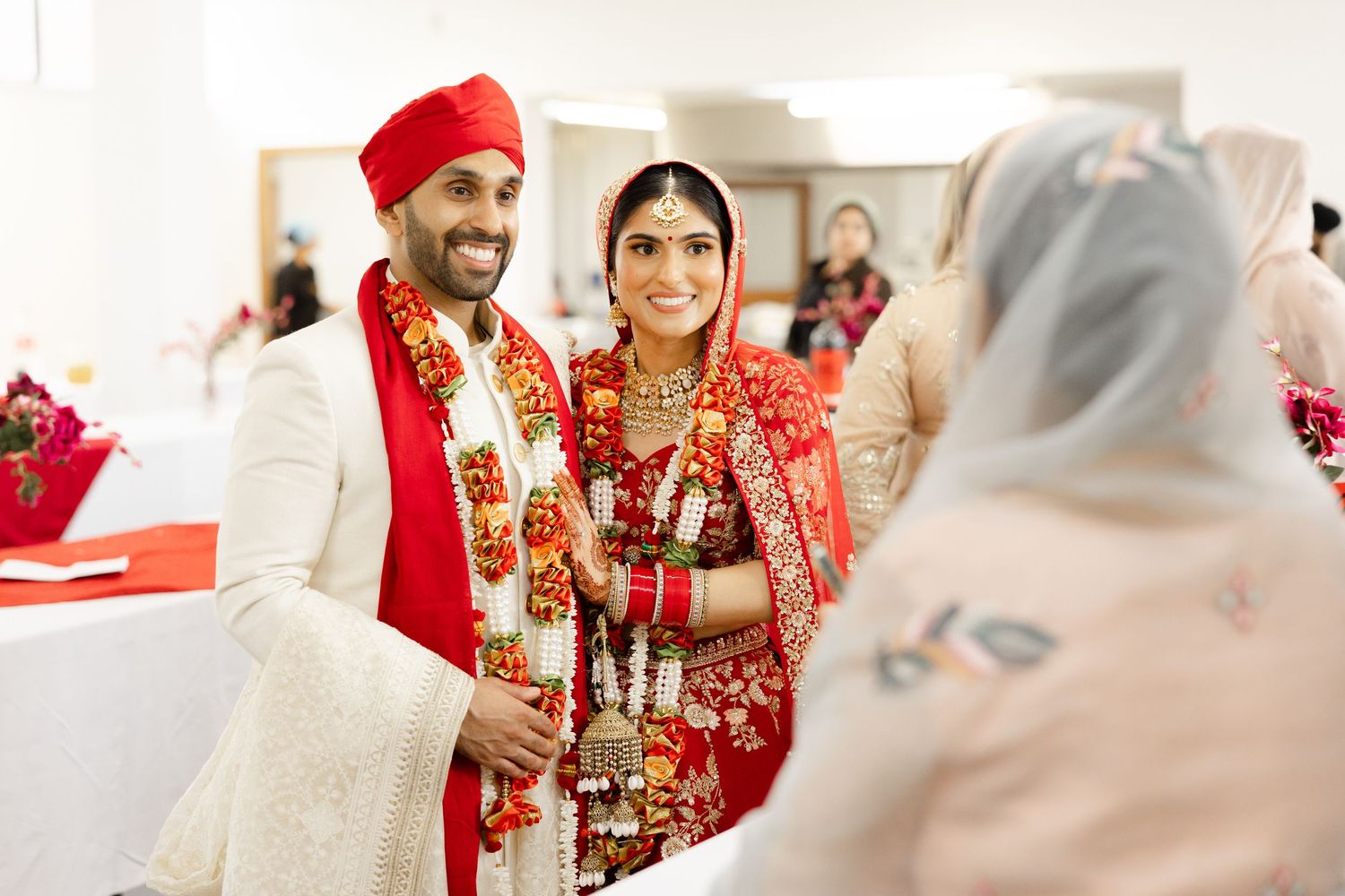 Candid moment of Sikh bride and groom in Hounslow Gurdwara