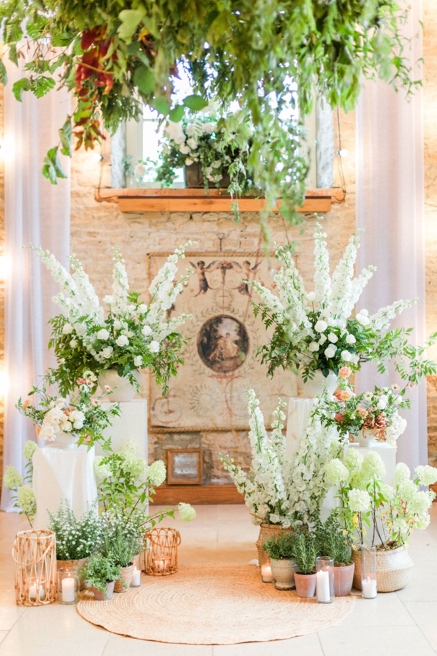 Elegant wedding altar decorated with white delphinium flowers, greenery vintage decor at Merriscourt by Hayley Elizabeth Oxfordshire photog