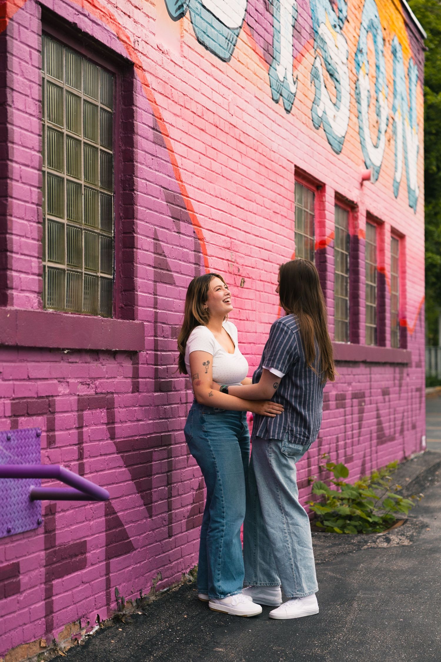 madison wi couples engagement photographer monroe street mural triangulador lauer realty group lgbtq colorful unique photos wisconsin urban