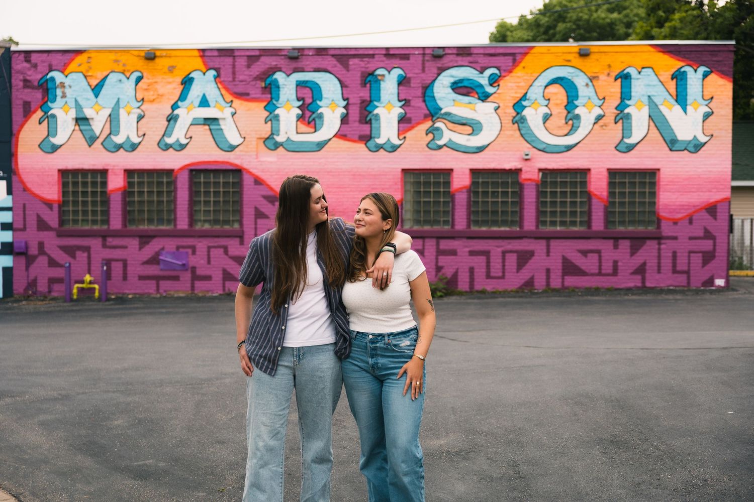 madison wi couples engagement photographer monroe street mural triangulador lauer realty group lgbtq colorful unique photos wisconsin urban