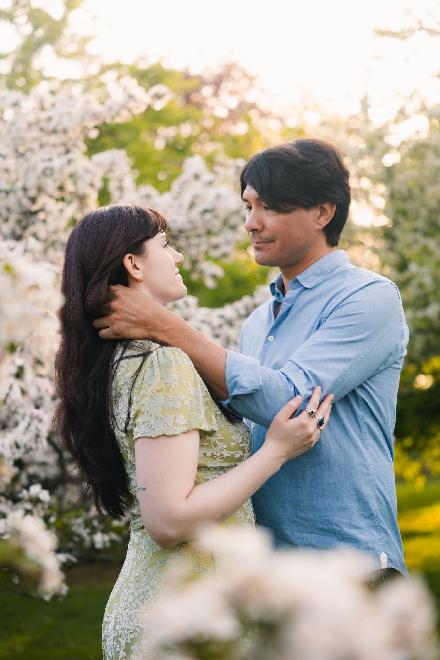 madison wi engagement couple photoshoot professional photographer spring uw arboretum cherry blossom trees lilacs middleton verona deforest