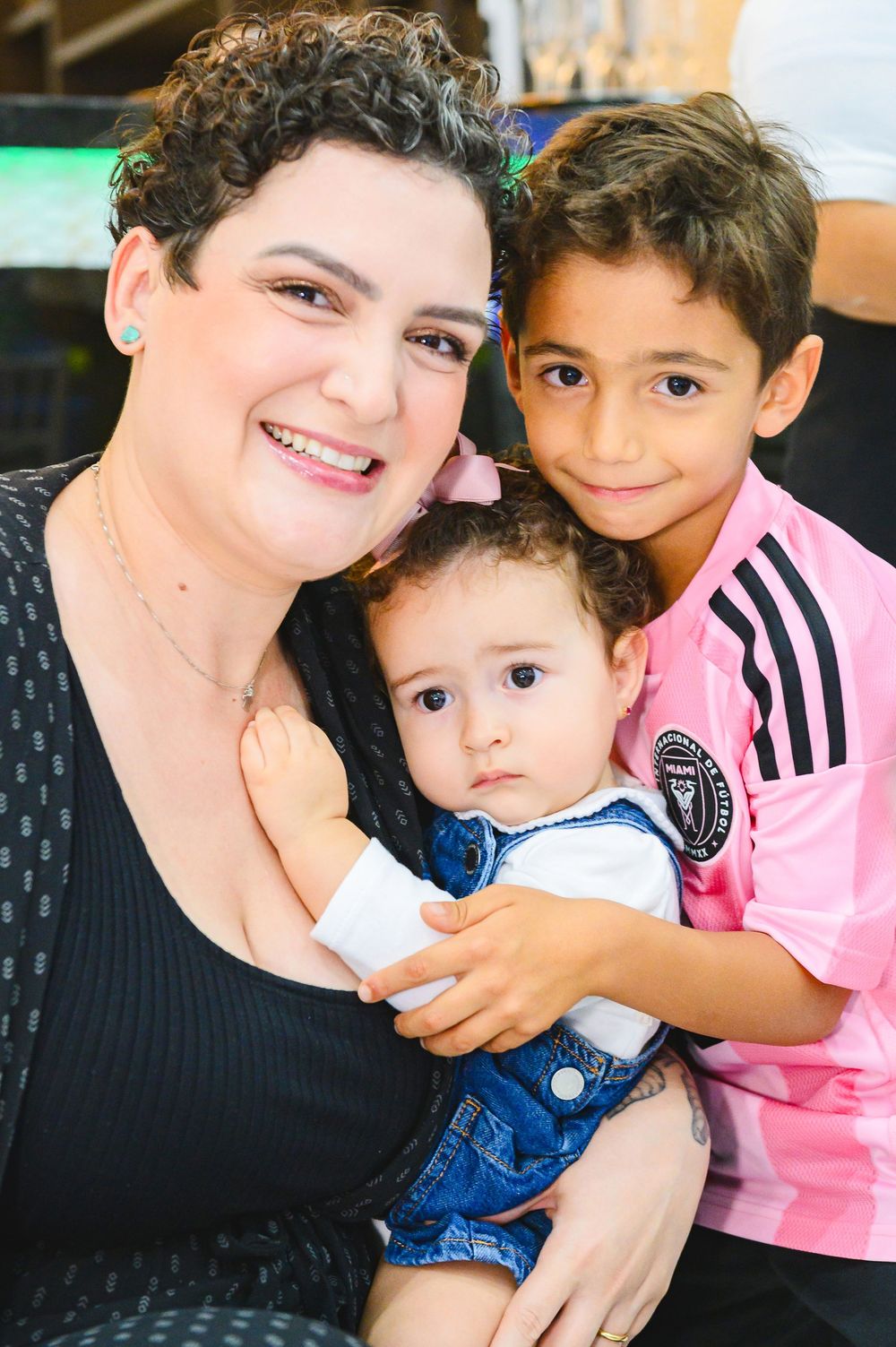 Portrait of people sharing a happy moment together while wearing casual attire.