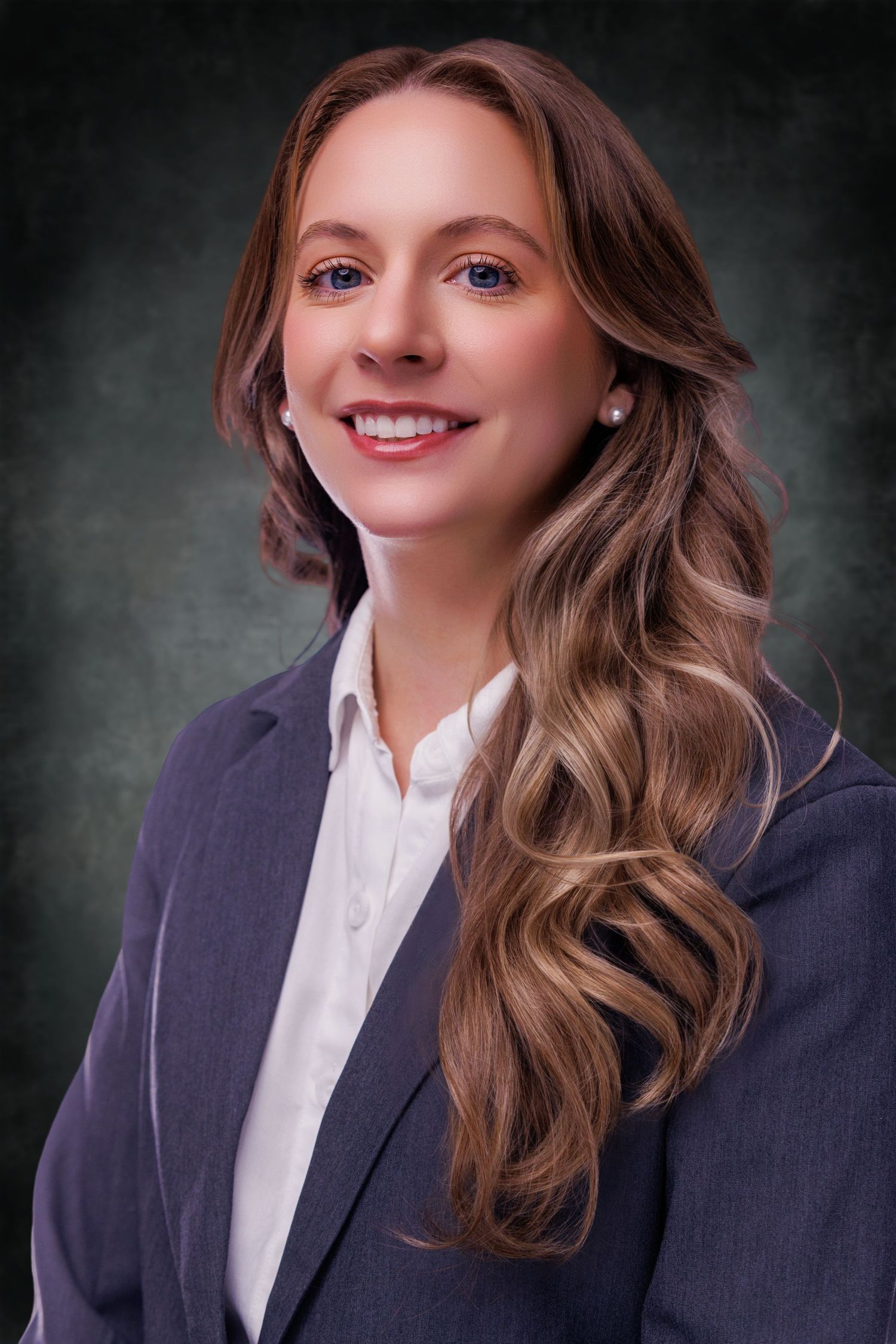Professional headshots expertly captured at our studio, offering a variety of background options for your selection. Wilson Photos.