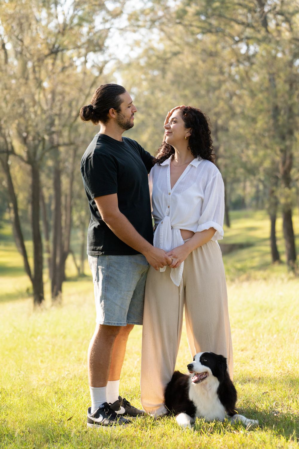a couple looking at each other during and canine end of life photoshoot