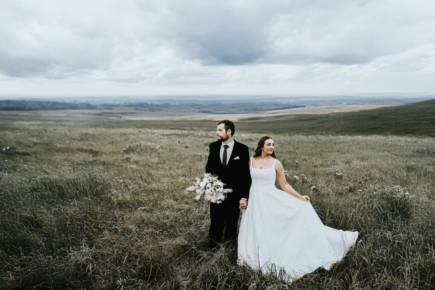 A newly married couple poses in Collinsville for their wedding photos taken by april pinto photography