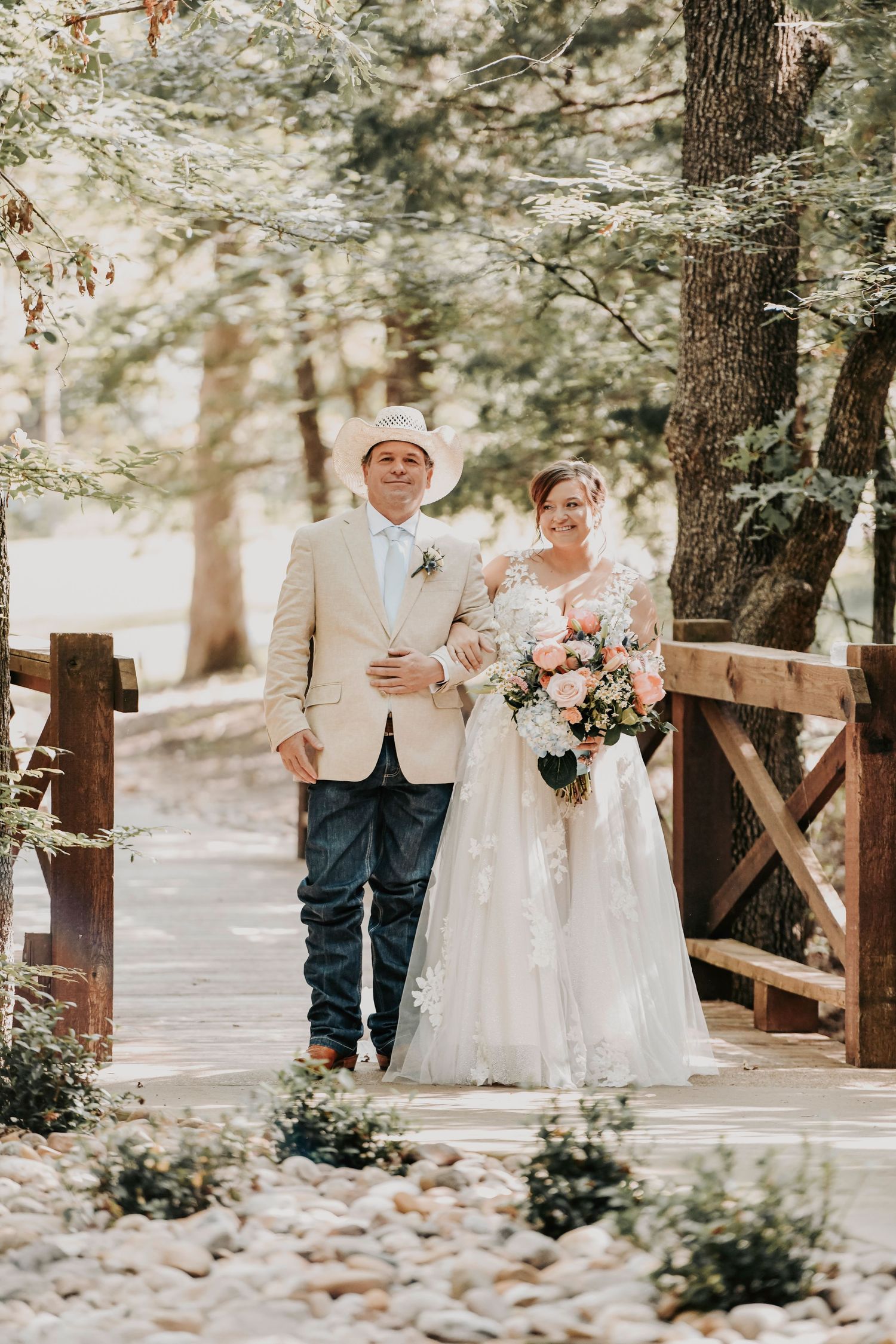 Emotional moment of bride and dad stepping into ceremony space