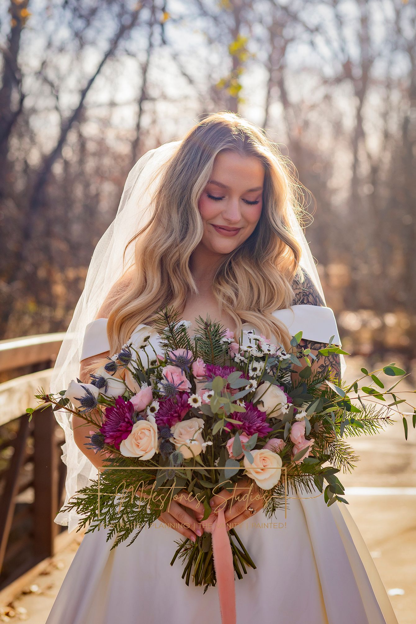 autumn sun backlit bride looking at flowers