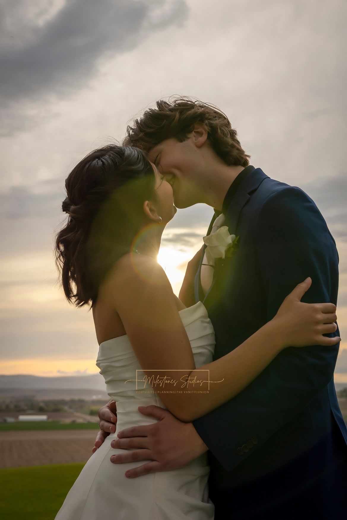 Bride and Groom almost kissing at sunset, sun peeking through, at Garman Hill