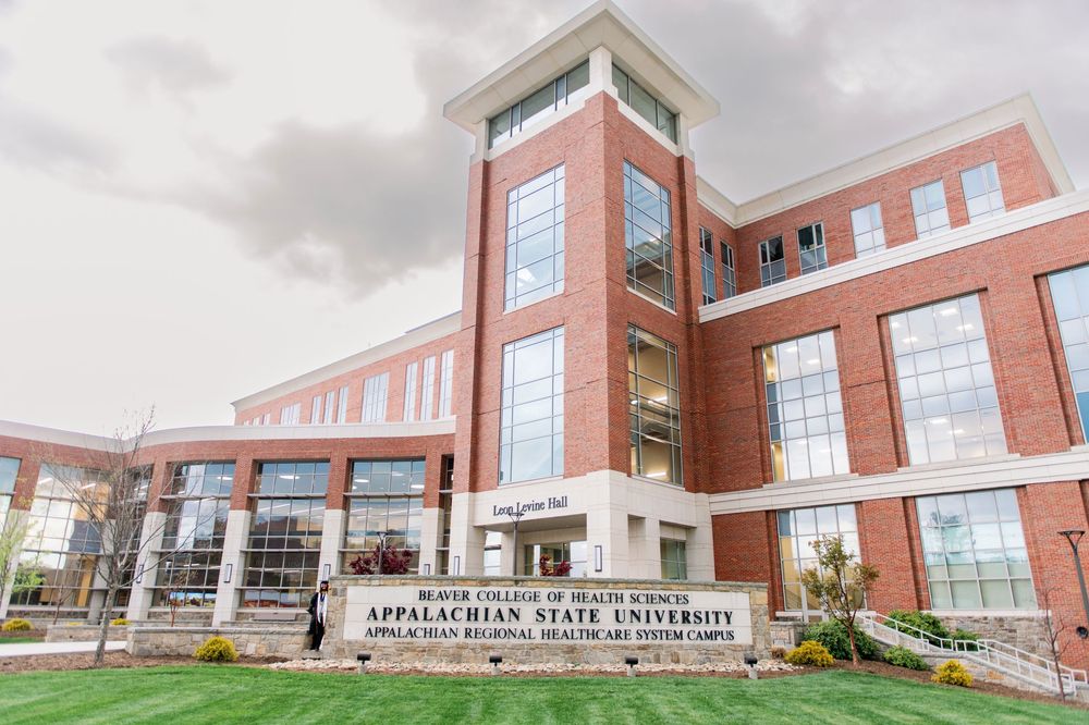 Modern brick and glass building exterior of Appalachian State University campus.