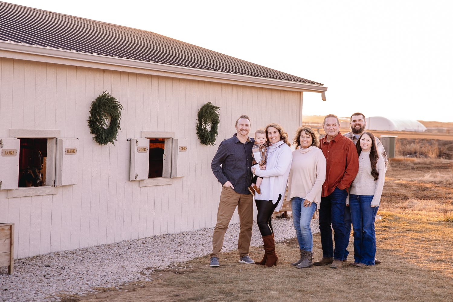 family of 7 looking at the photographer from colorado while posing for a picture.