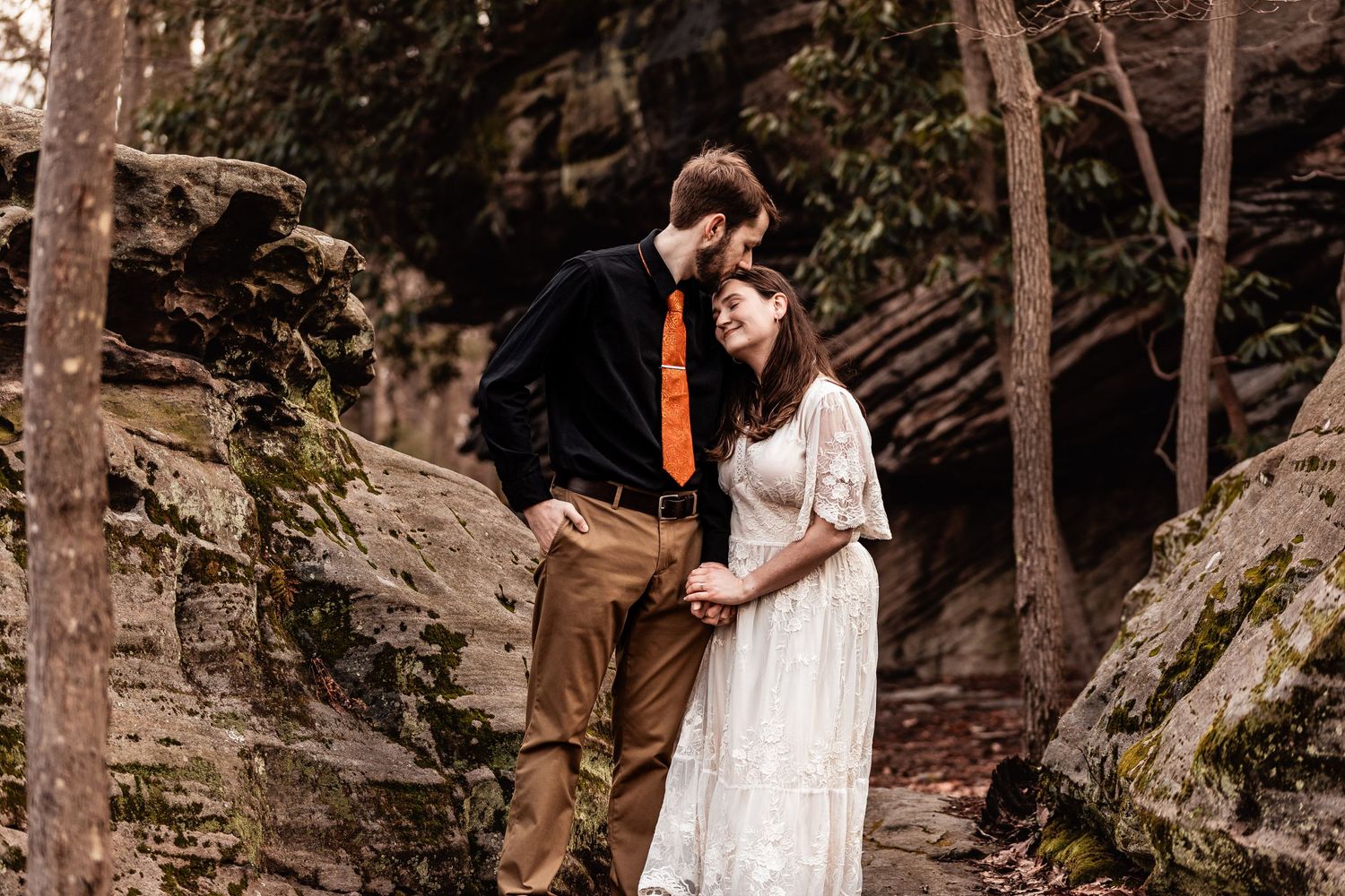 WV engaged couple kiss at Coopers Rock State Park
