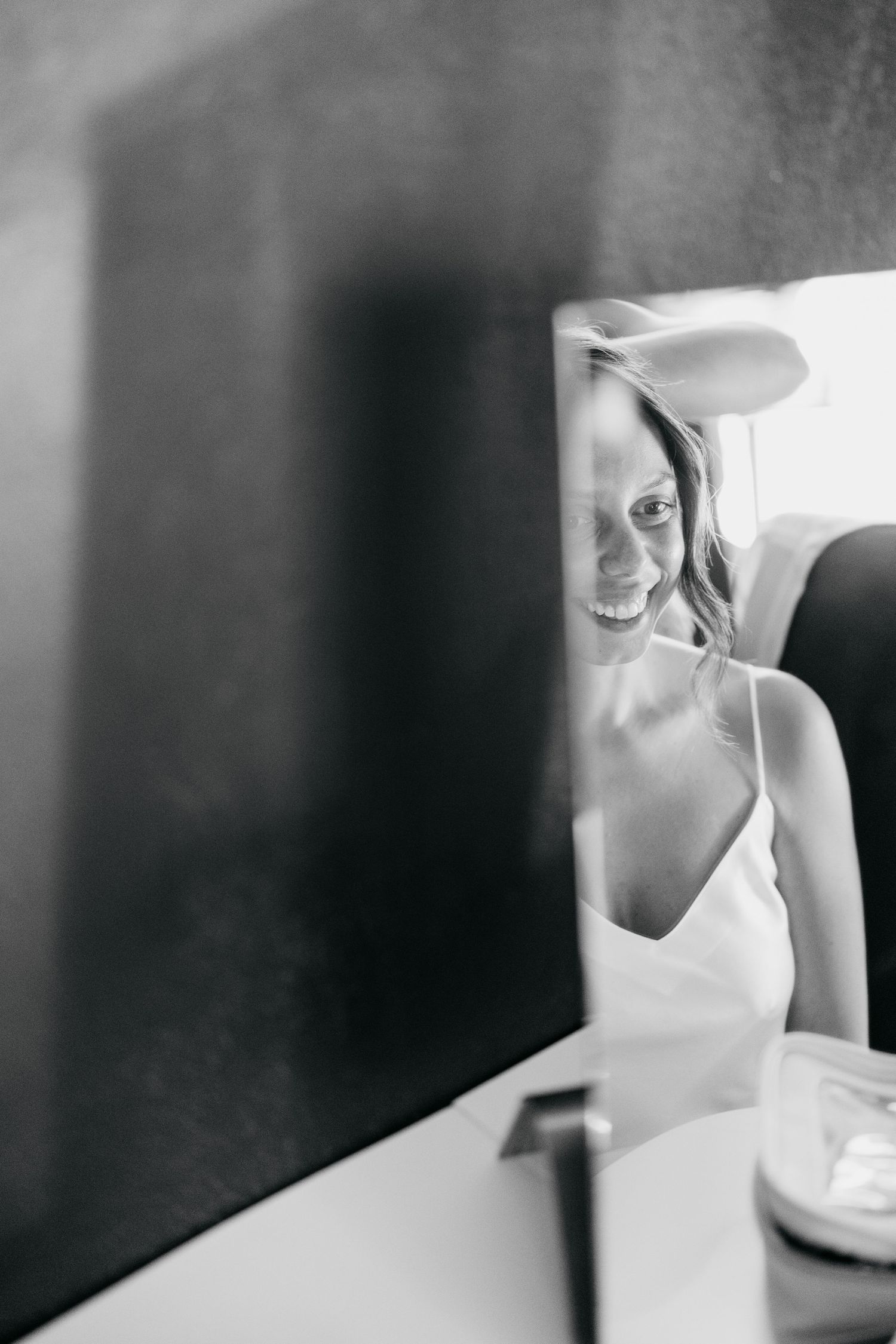 Artistic black and white series of getting ready moments on the wedding morning.