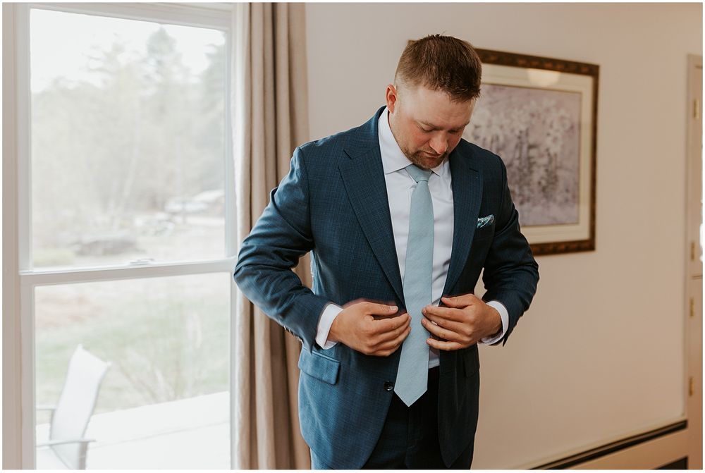 Groom getting ready at the Preserve at Chocorua