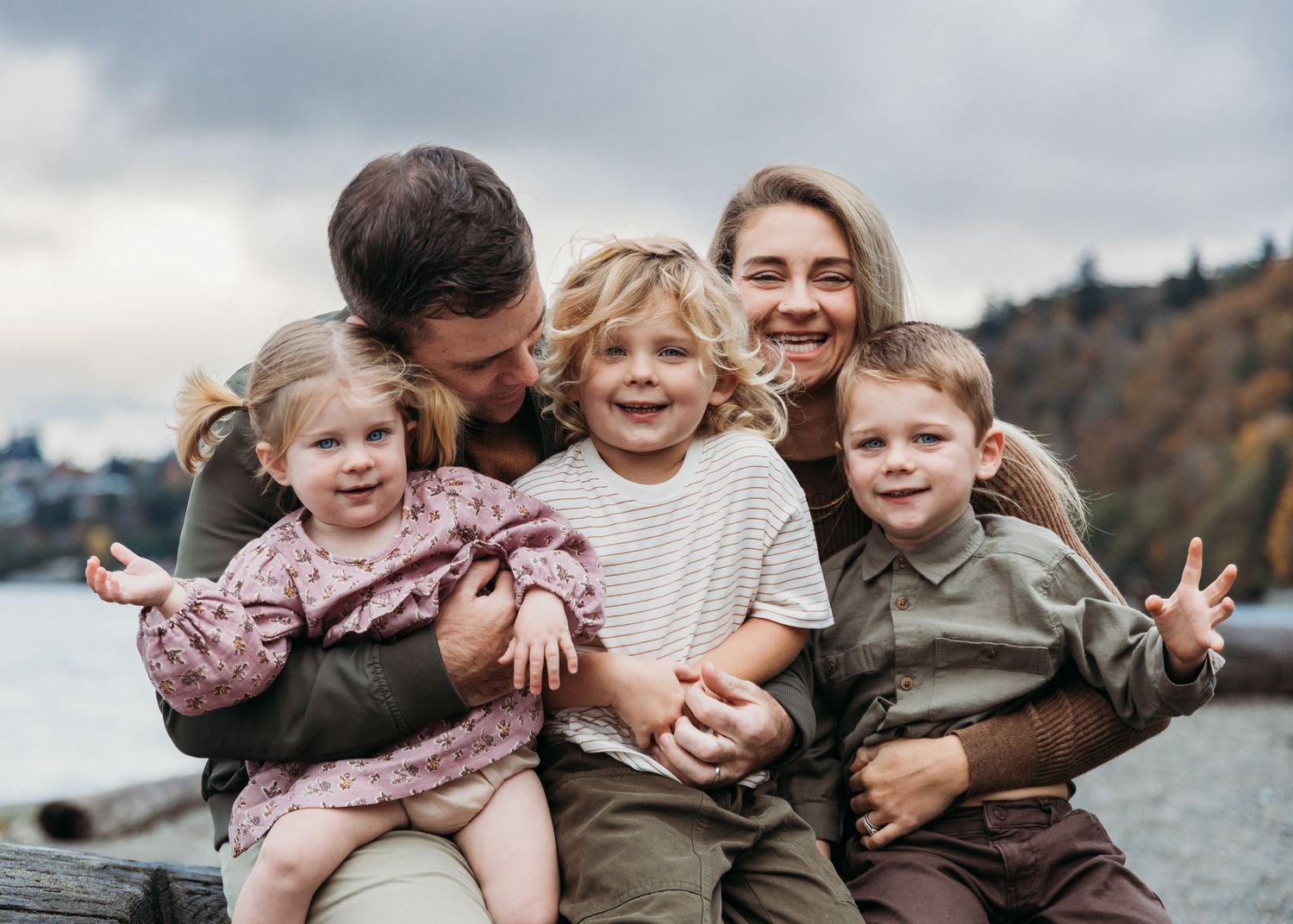 A series of candid outdoor family photos showing joyful moments and embraces against natural backgrounds.