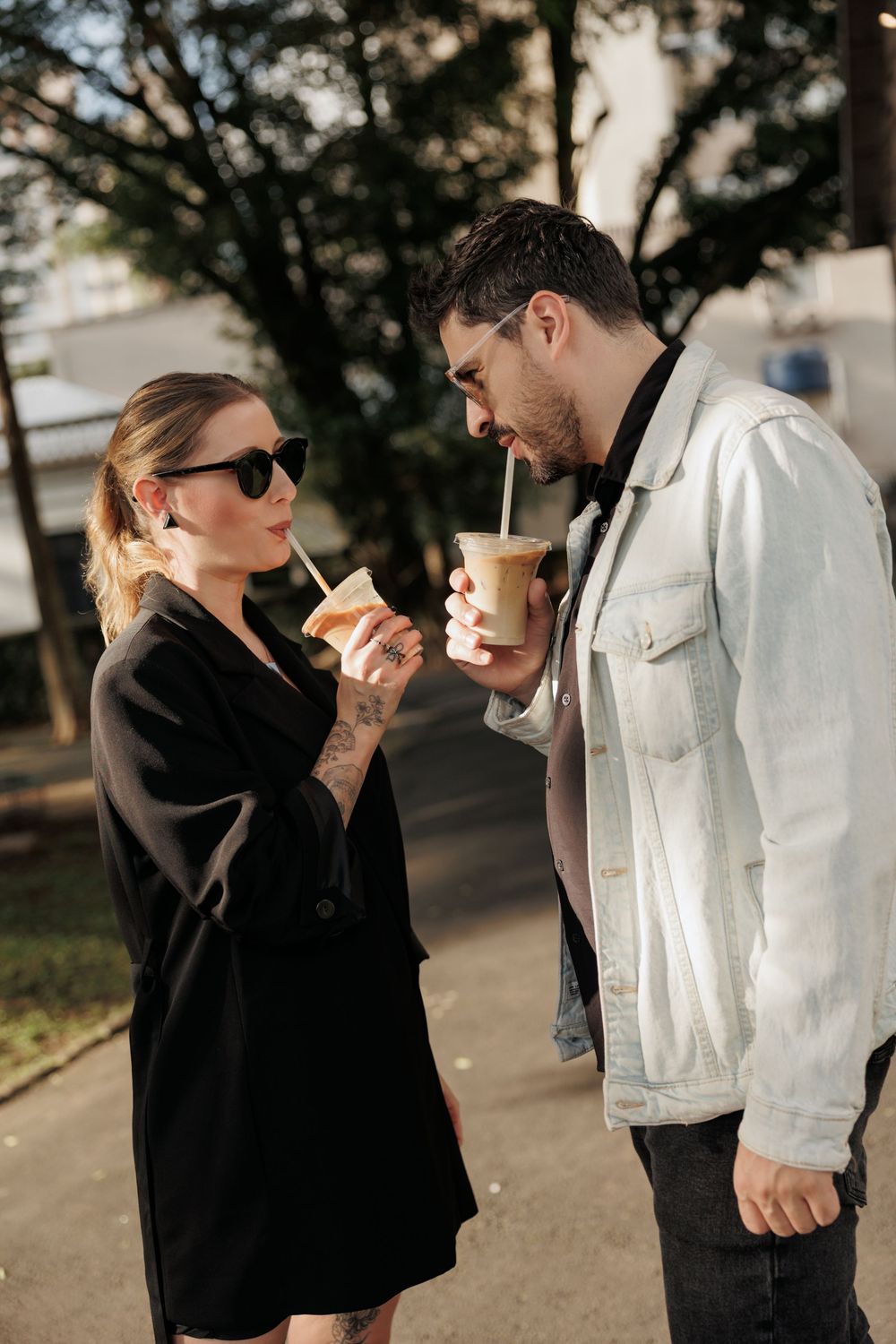 Five sequential photos showing a couple sharing drinks and casual moments outdoors on a sunny day.