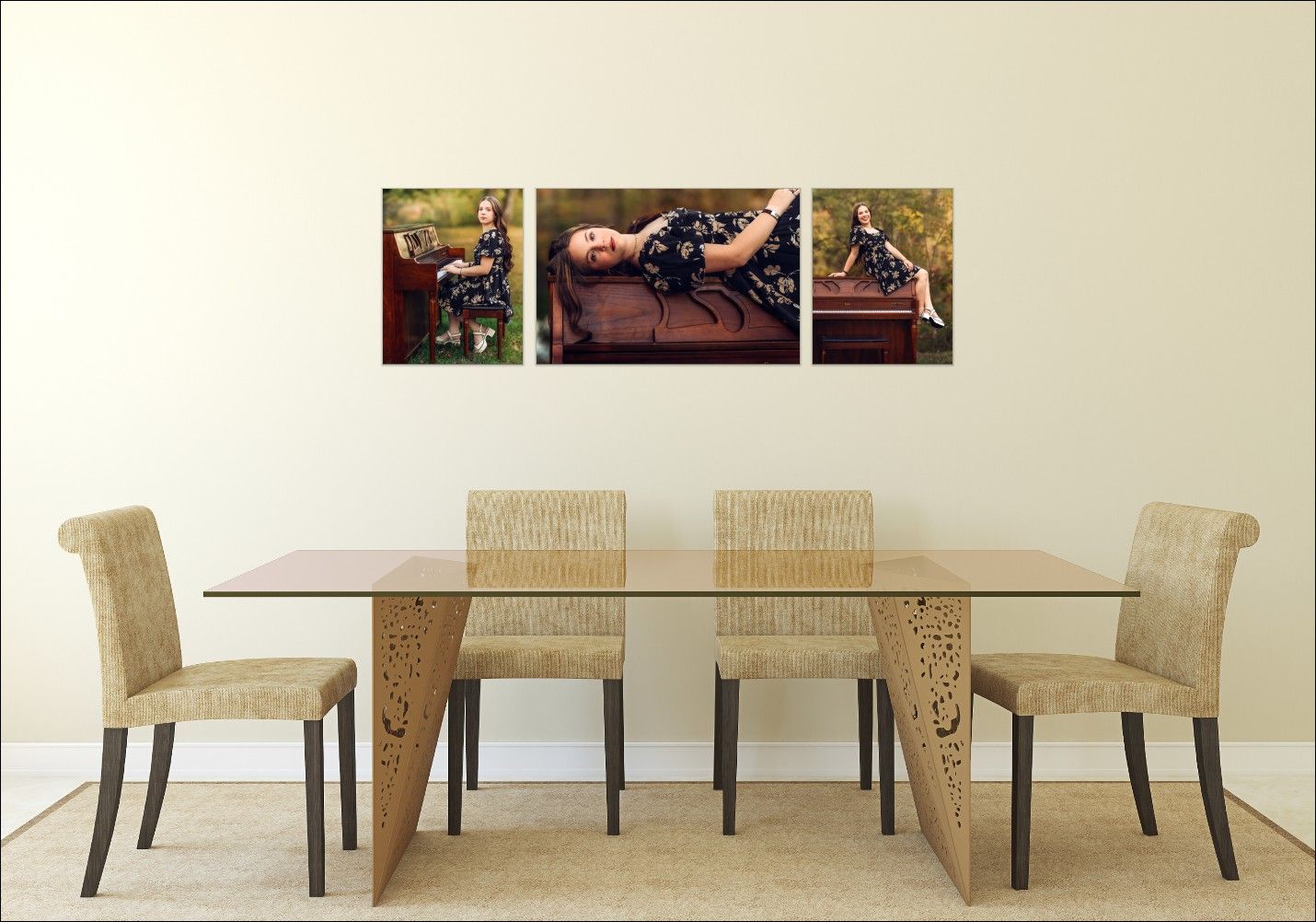 Modern dining room with glass table, beige upholstered chairs, and three dark artistic prints on neutral wall.