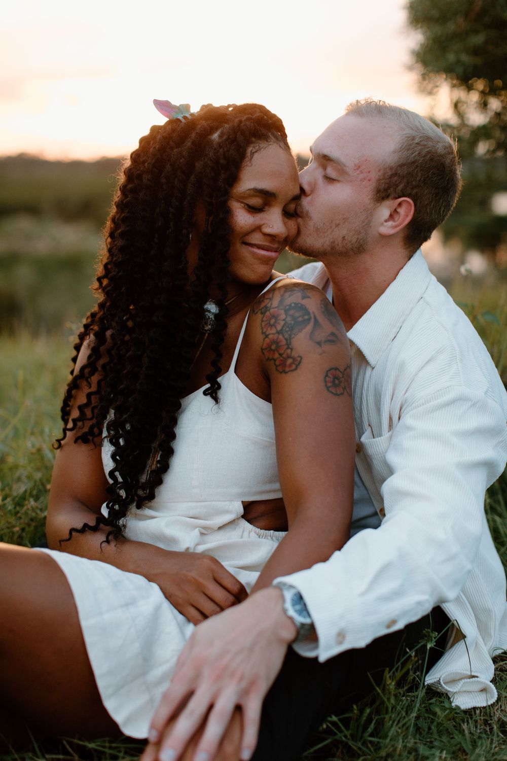 A romantic outdoor portrait session showing a couple's intimate moments in nature.