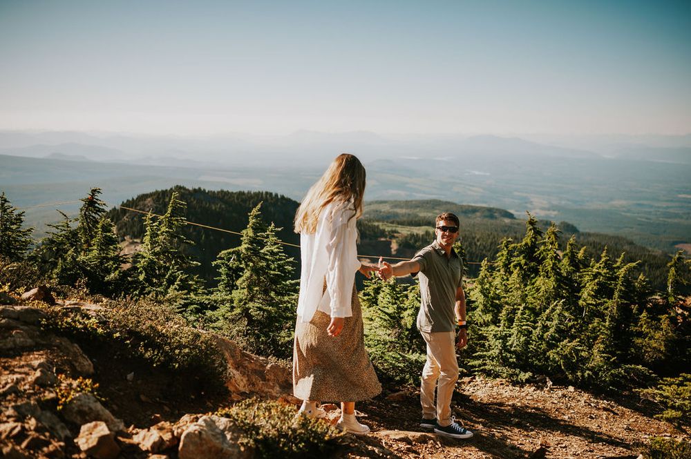 Couple hiking a photoshoot with breathtaking Mount Washington mountain views Photography by Soulfull Photographs