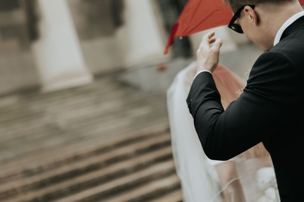 A tender moment captured between a couple during their wedding ceremony.