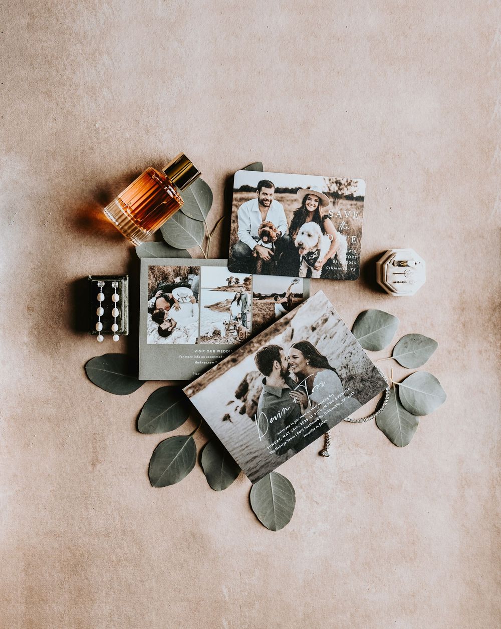 a boho flat lay of the bridal details on a rustic background