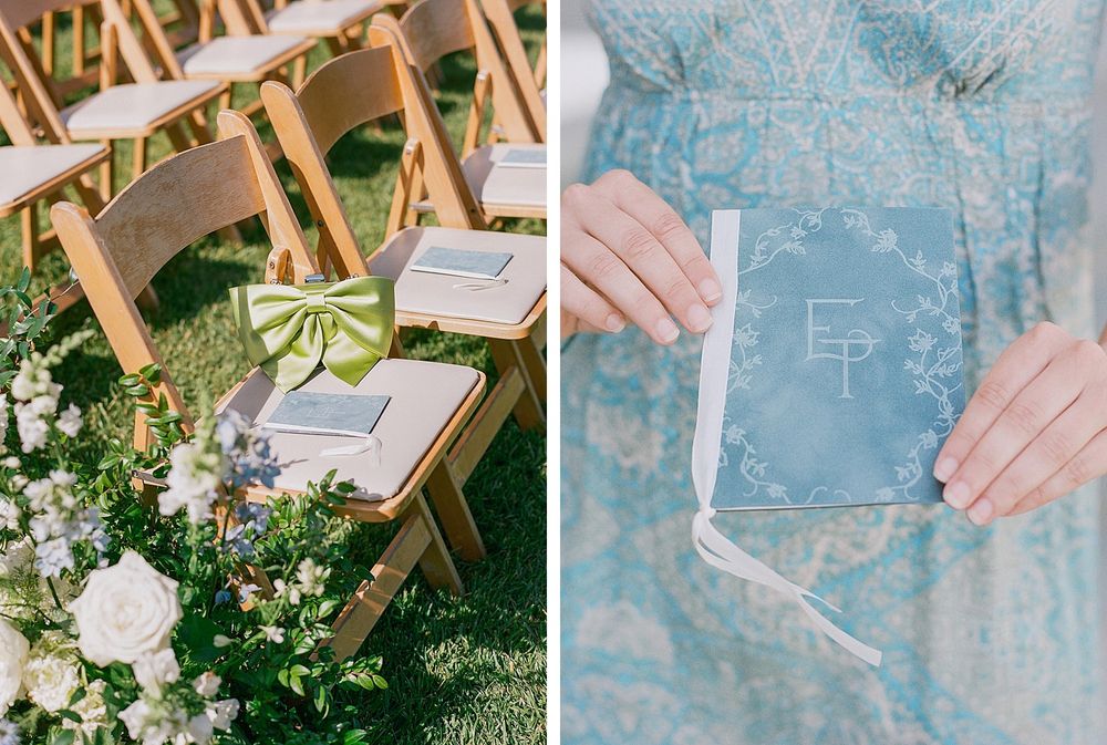 Floral arrangements and paper programs decorate wooden folding chairs at an outdoor ceremony setup.