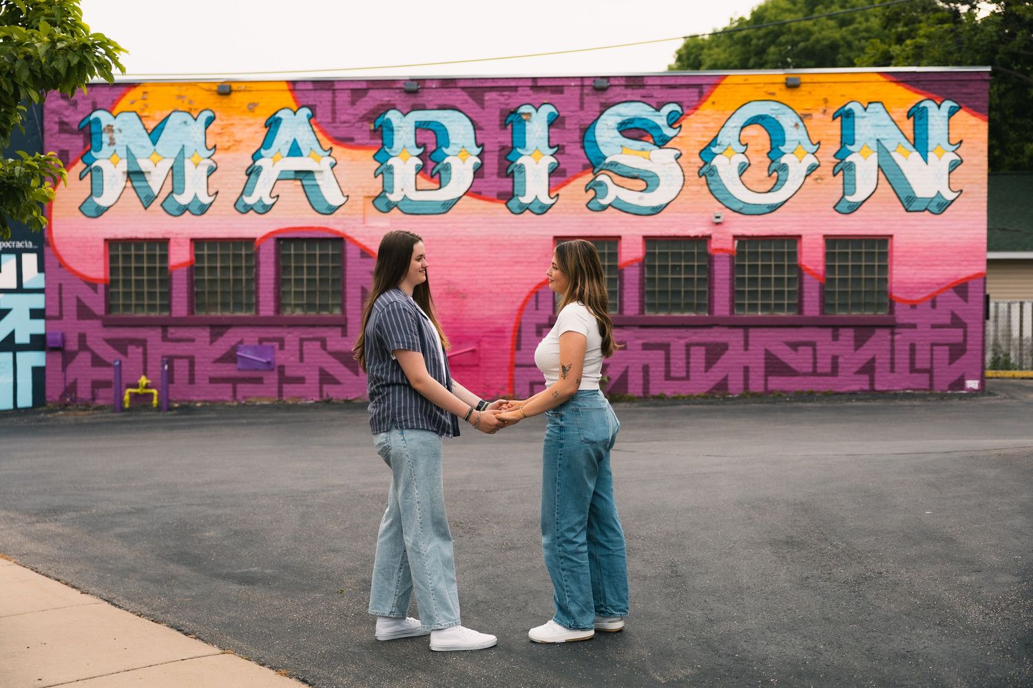 madison wi couples engagement photographer monroe street mural triangulador lauer realty group lgbtq colorful unique photos wisconsin urban